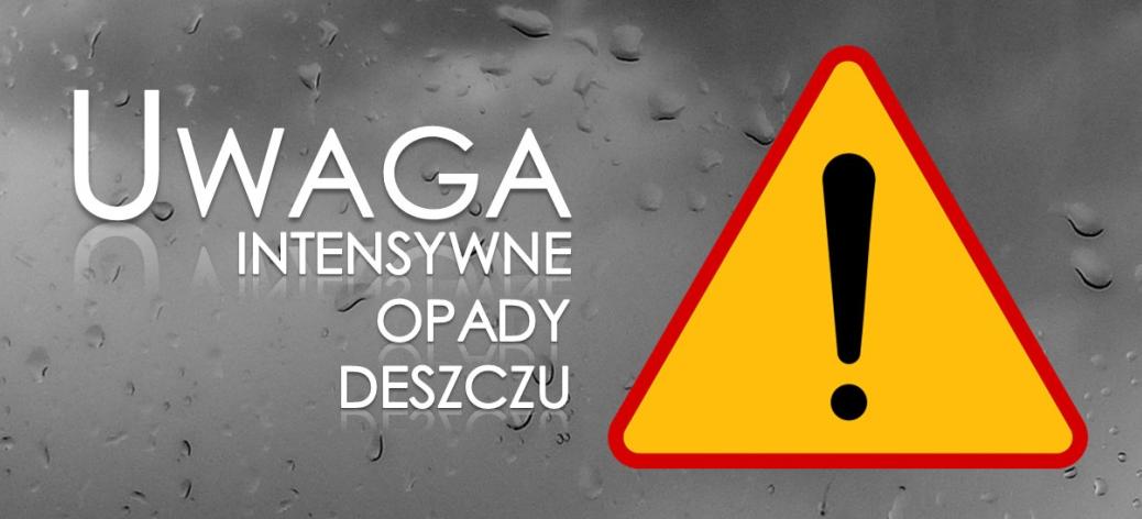napis intensywne opady deszczu oraz znak drogowy z wykrzyknikiem