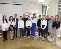 Wspólna fotografia uczestników warsztatu w sali konferencyjnej RCK.