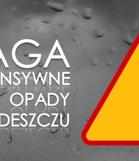 napis intensywne opady deszczu oraz znak drogowy z wykrzyknikiem 